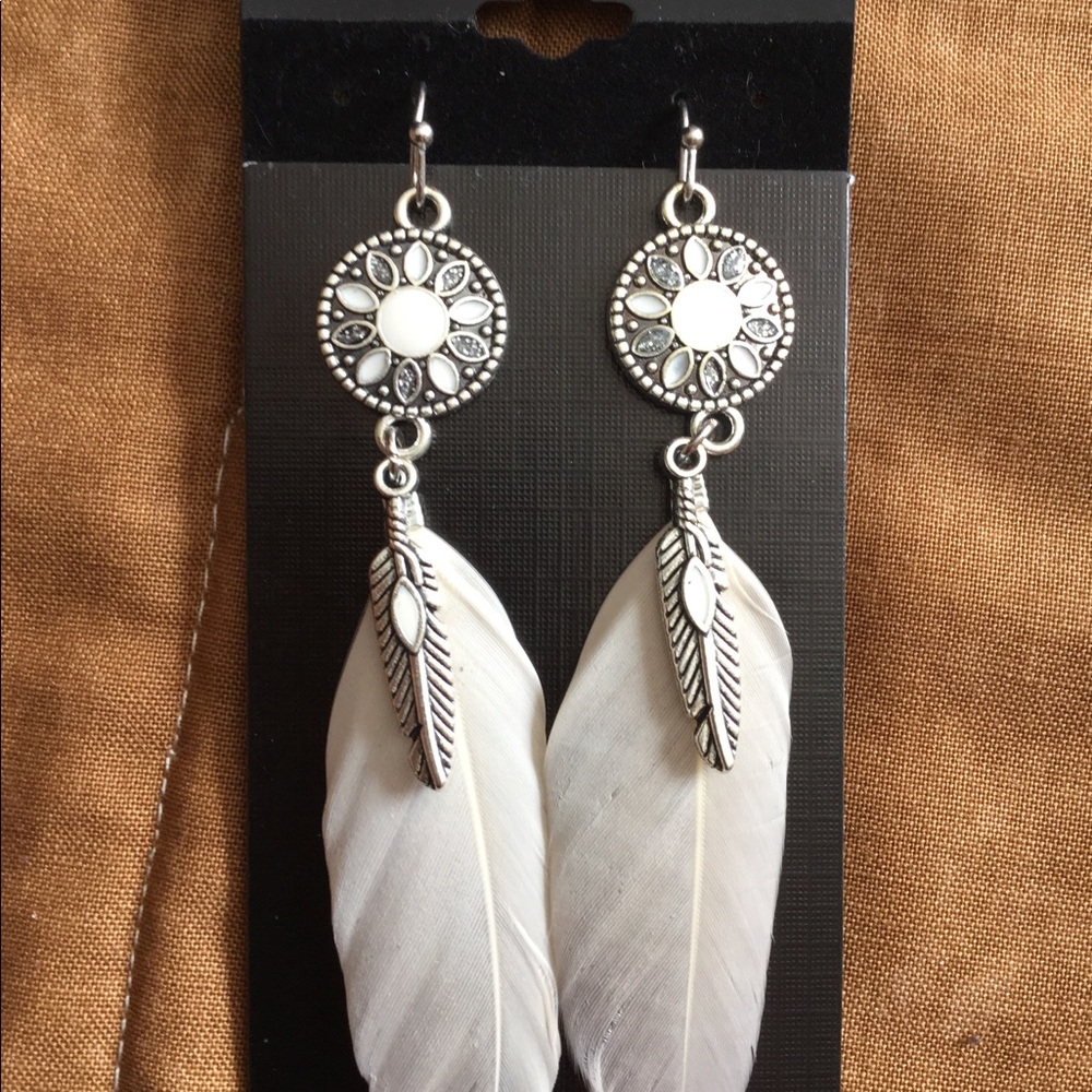 Real feather earrings, new